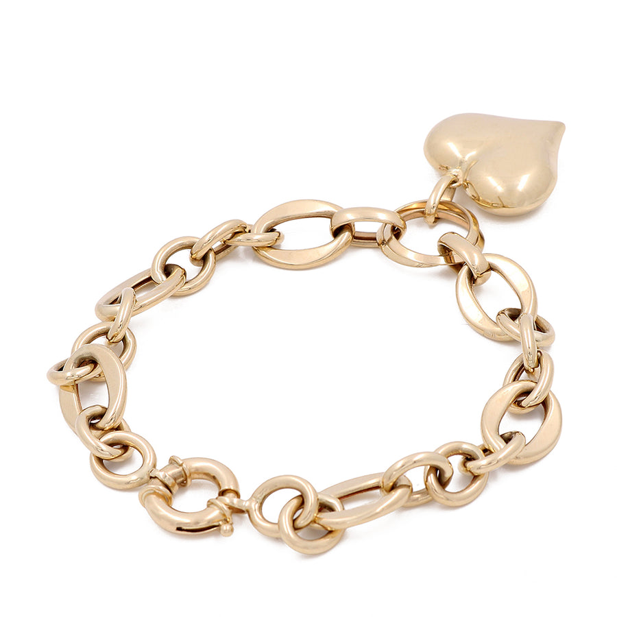 A Miral Jewelry 14K Yellow Gold Women's Bracelet with Heart Bead.