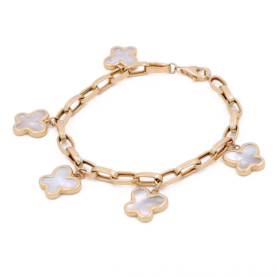 A 14K Yellow Gold Miral Jewelry fashion flowers bracelet adorned with large links.