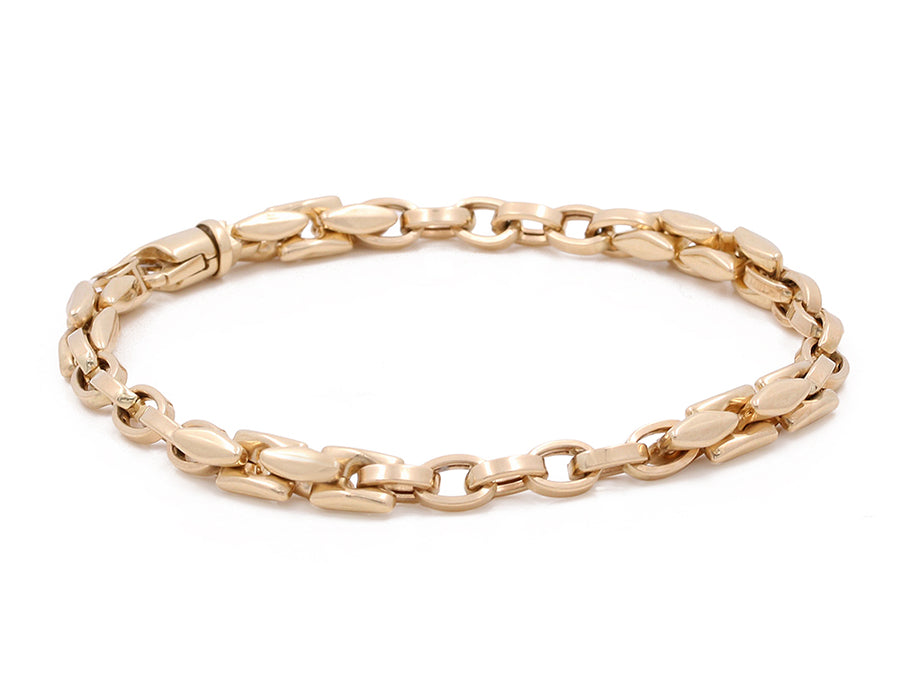 Miral Jewelry's 14K yellow gold fashion links bracelet displayed against a white background.