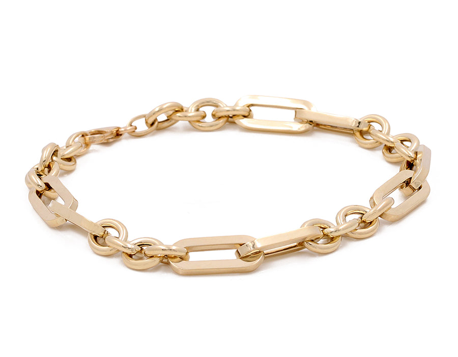 Miral Jewelry's 14K Yellow Gold Fashion Links Bracelet is isolated on a white background.