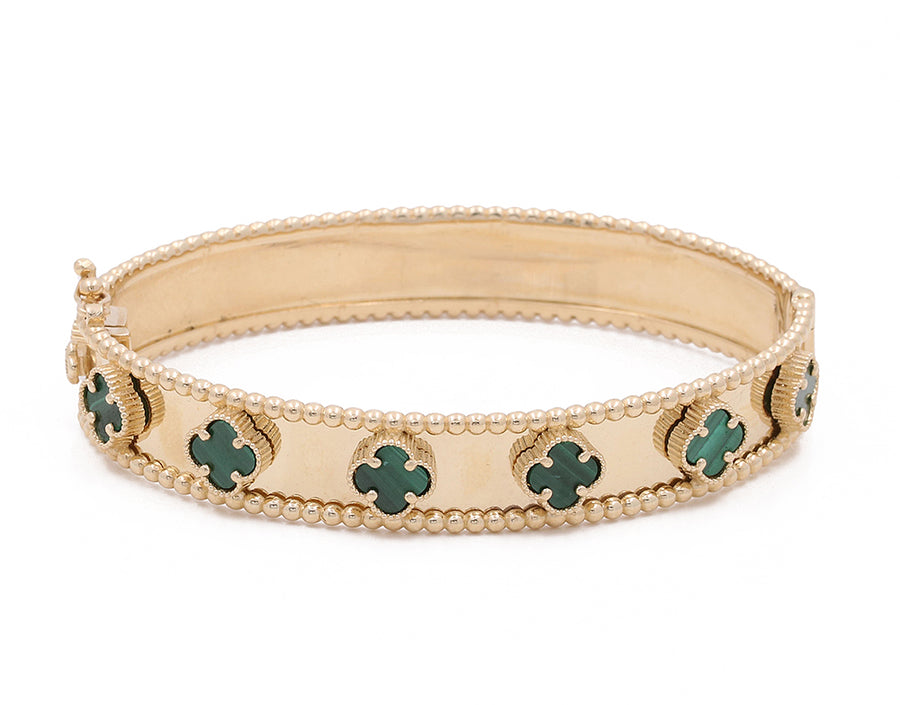 14K Yellow Gold Miral Jewelry Fashion Green Flower Bracelet decorated with small pearls, featuring an intricate design and clasp closure.