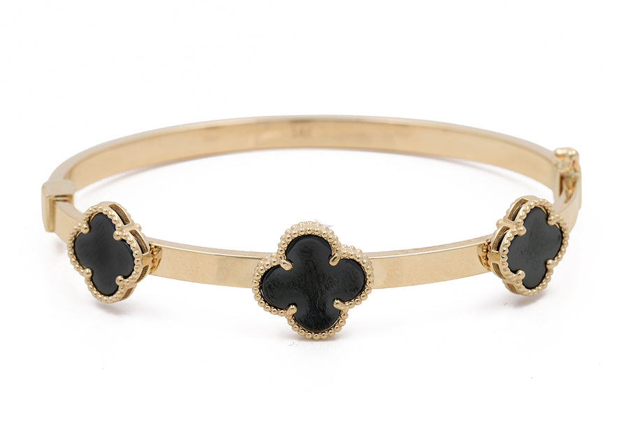 14K Yellow Gold Fashion with Onyx Flowers Bracelet by Miral Jewelry, displayed on a white background.