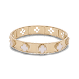 The 14K Yellow Gold Fashion Flower Women's Mother of Pearl Bracelet by Miral Jewelry showcases floral and beaded designs with mother of pearl accents and cut-out flower shapes along the band.