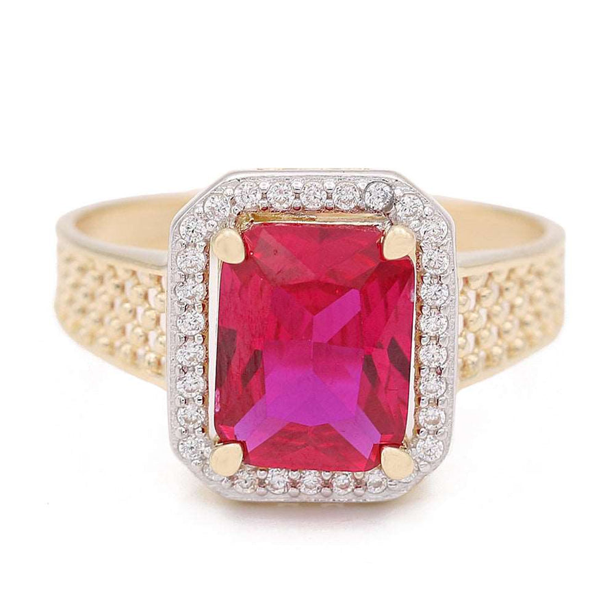 A 14K Yellow Gold Fashion Ring with Pink Center Stone and Cubic Zirconias by Miral Jewelry.