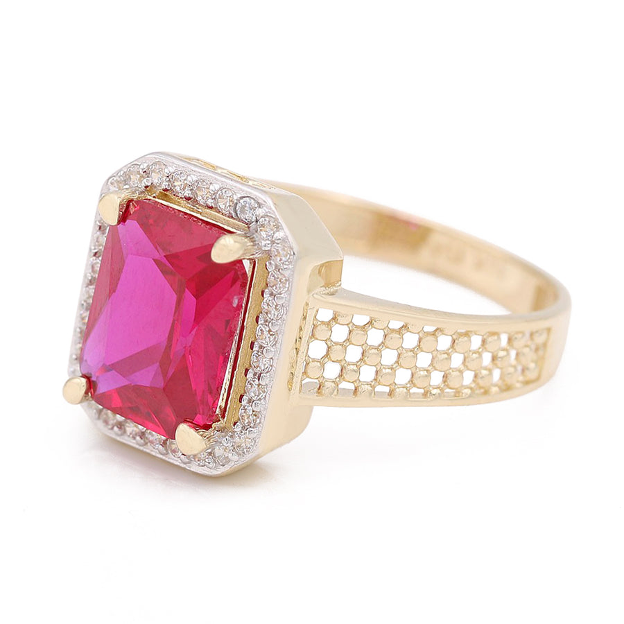 A Miral Jewelry 14K Yellow Gold Fashion Ring with Pink Center Stone and Cubic Zirconias, with diamonds.