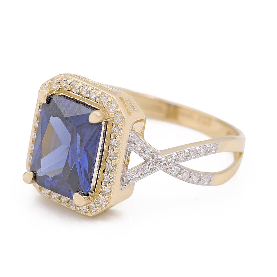 A Miral Jewelry 14K Yellow Gold Fashion Ring with Blue Square Center Stone and Cubic Zirconias.