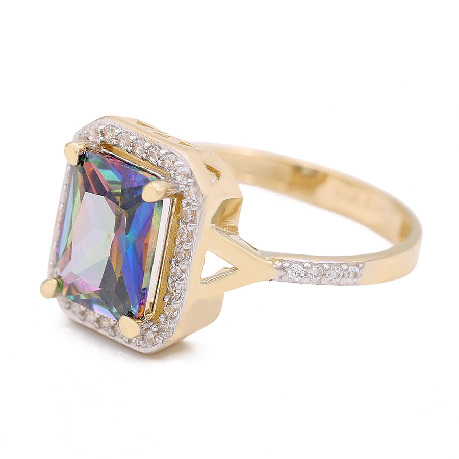 A Miral Jewelry 14K Yellow Gold Fashion Ring with Color Center Stone and Cubic Zirconias.