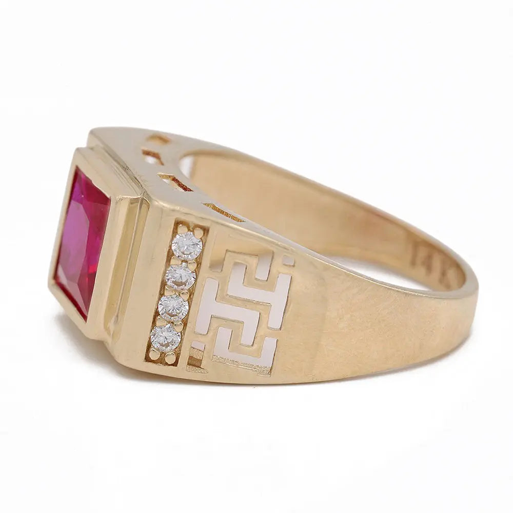 A Miral Jewelry Yellow Gold 14K Fashion Ring featuring a square red gemstone and five small, round CZ stones set beside an engraved geometric pattern.