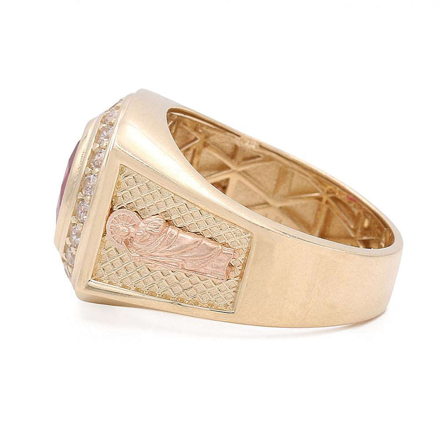 A Miral Jewelry fashion ring in 14K yellow and rose gold featuring a color stone adorned with diamonds.