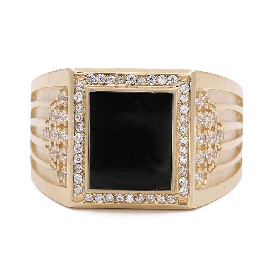 A Miral Jewelry 14K Yellow Gold Fashion Ring featuring a black onyx stone and sparkling cubic zirconias.
