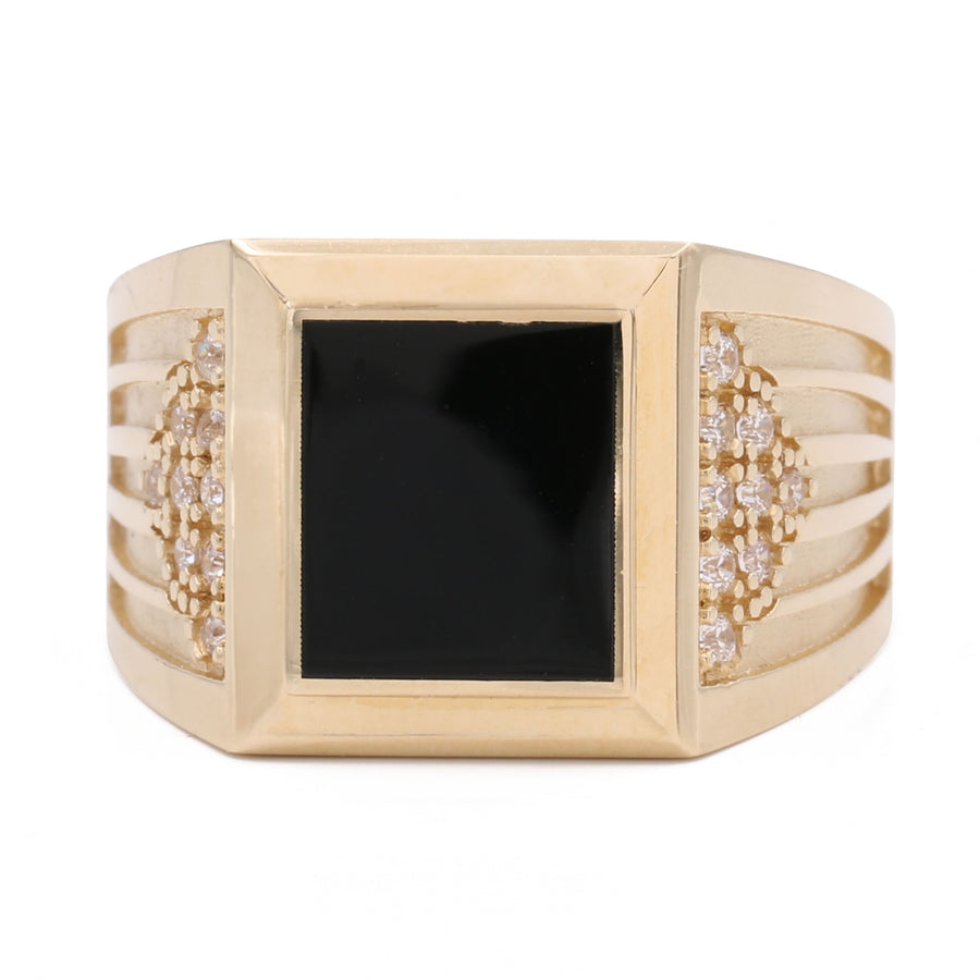 A Miral Jewelry 14K Yellow Gold Fashion Ring with Black Color Center Stone and Cubic Zirconias.