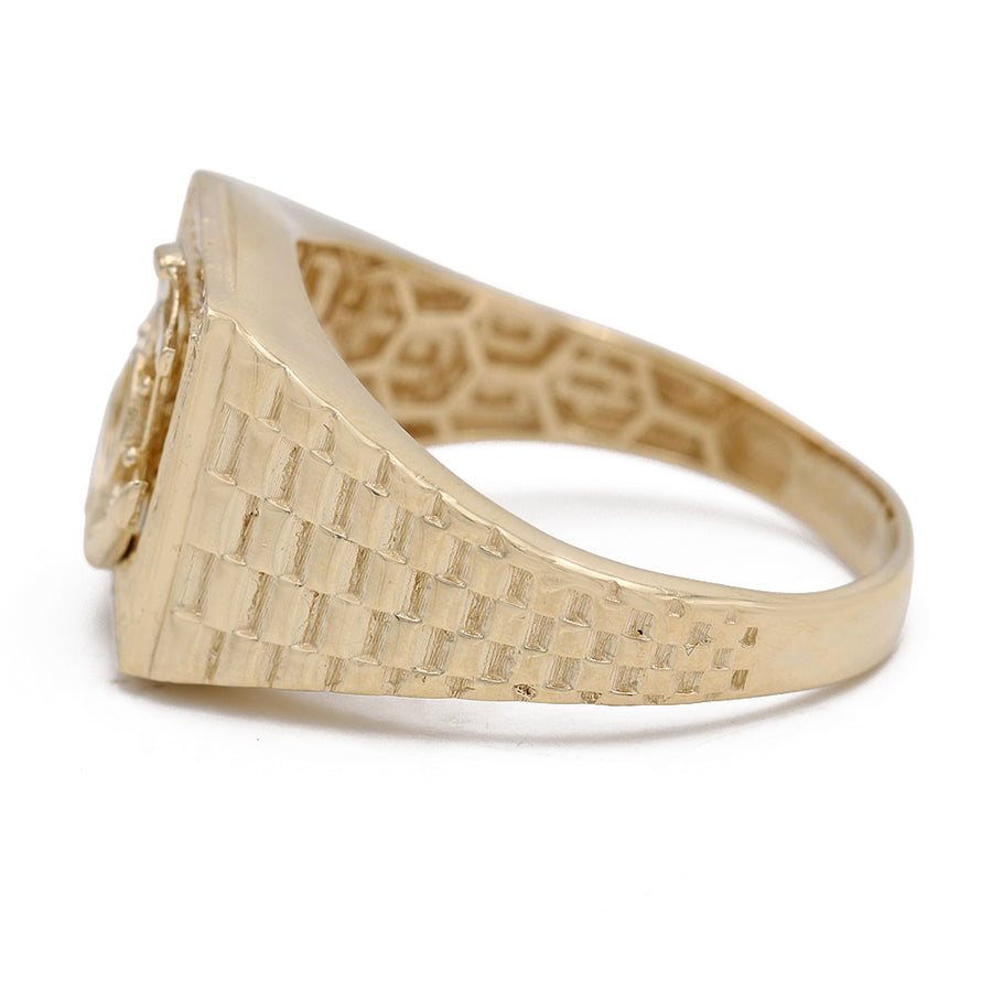 A Miral Jewelry Yellow Gold 14K Fashion Ring with a diamond in the center.
