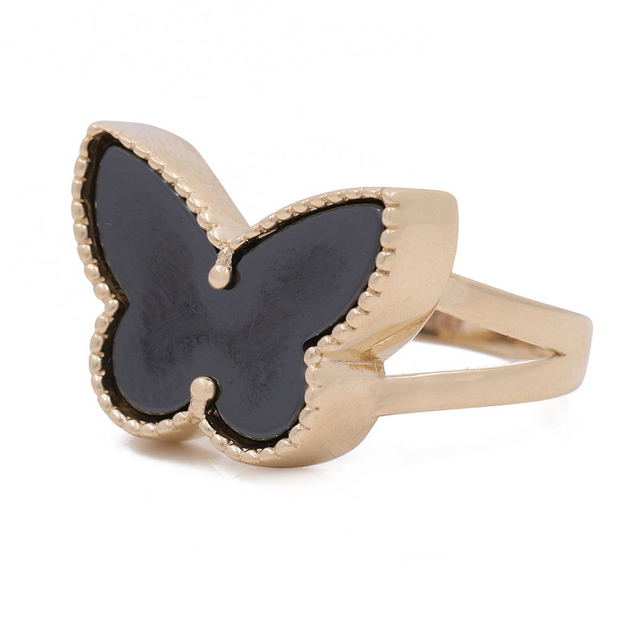 A Miral Jewelry 14K Yellow Gold with Black Onyx Butterfly Fashion Ring, featuring a stunning butterfly design. This fashion ring exudes elegance and style.