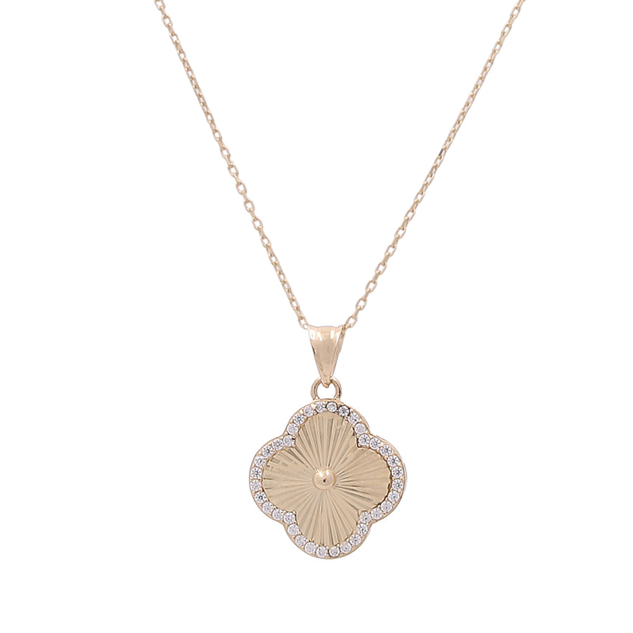 A Miral Jewelry 14K Yellow Gold Fashion Flower Pendant with Diamond Cut Necklace with diamonds on a diamond cut necklace.