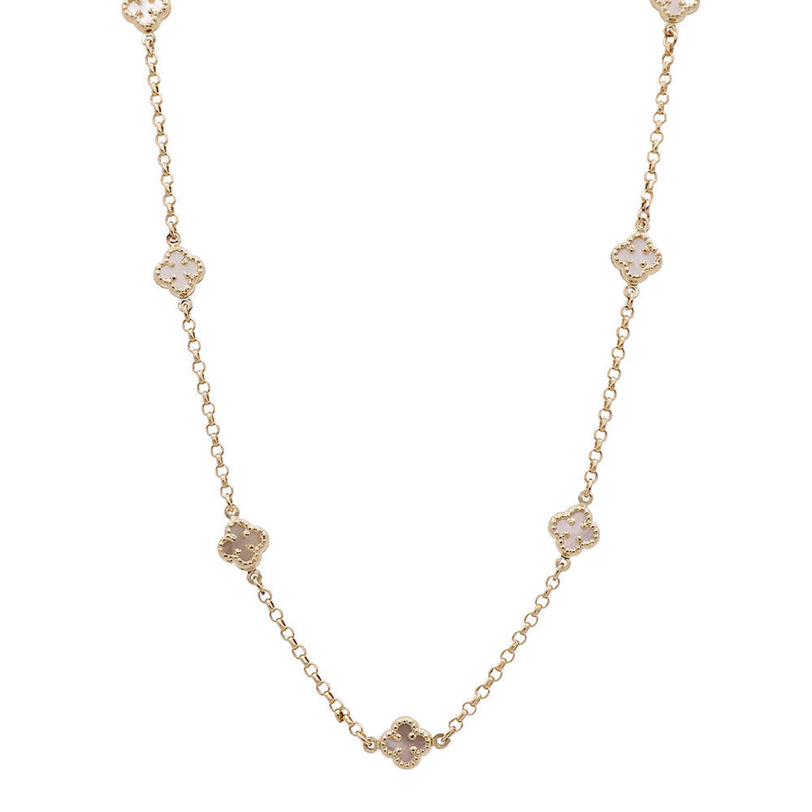 A Miral Jewelry 14K yellow gold necklace with white diamond flowers.