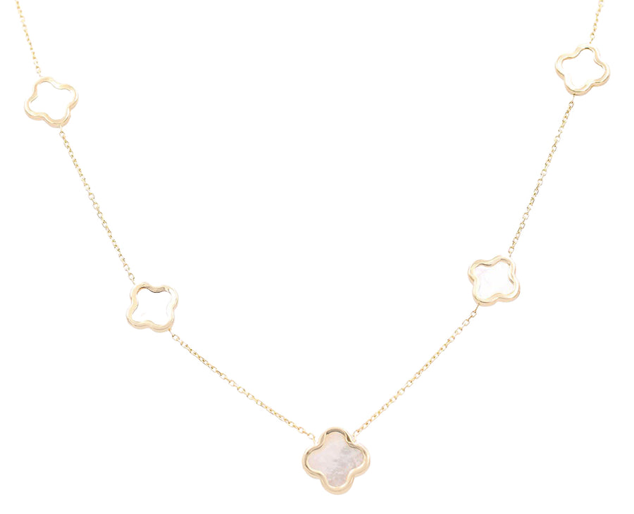 A Miral Jewelry necklace with a 14K Yellow Gold Fashion Flowers Mother of Pearl stone and gold-plated charms.