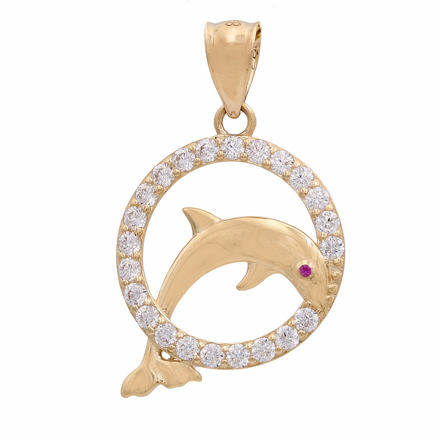A Miral Jewelry 14K yellow gold jumping dolphin pendant with cubic zirconias.