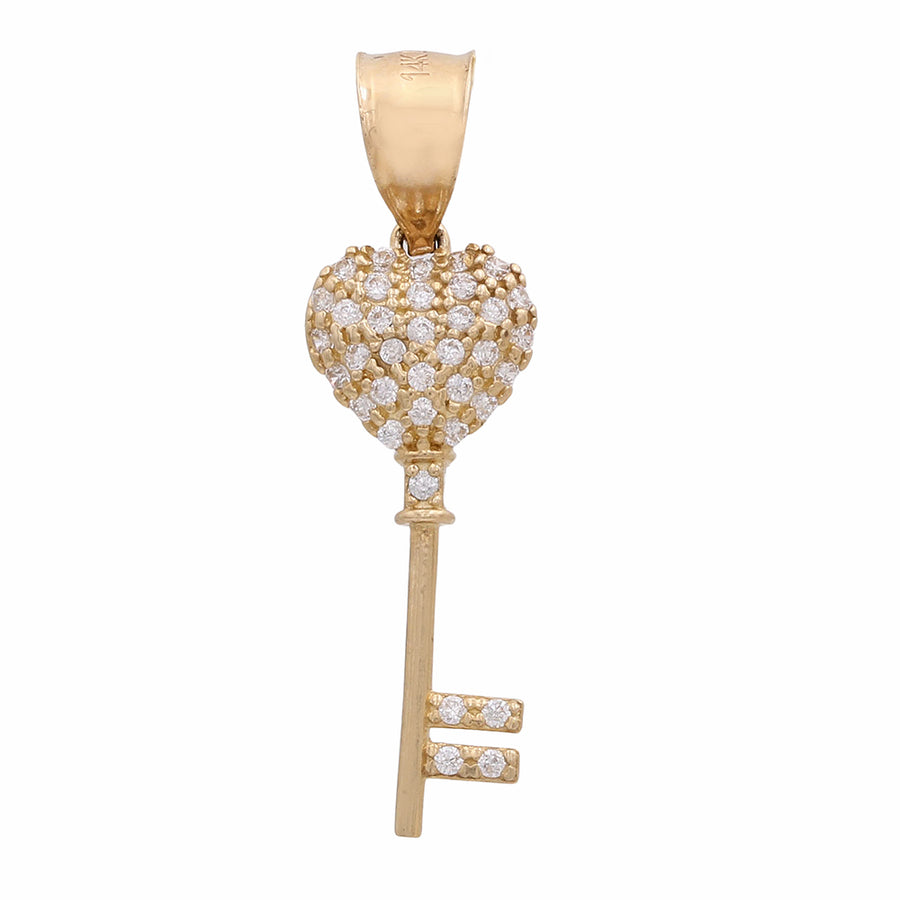 A timeless Miral Jewelry 14K Yellow Gold Key and Heart with Cubic Zirconias pendant adorned with diamonds for a touch of elegance and sophistication.