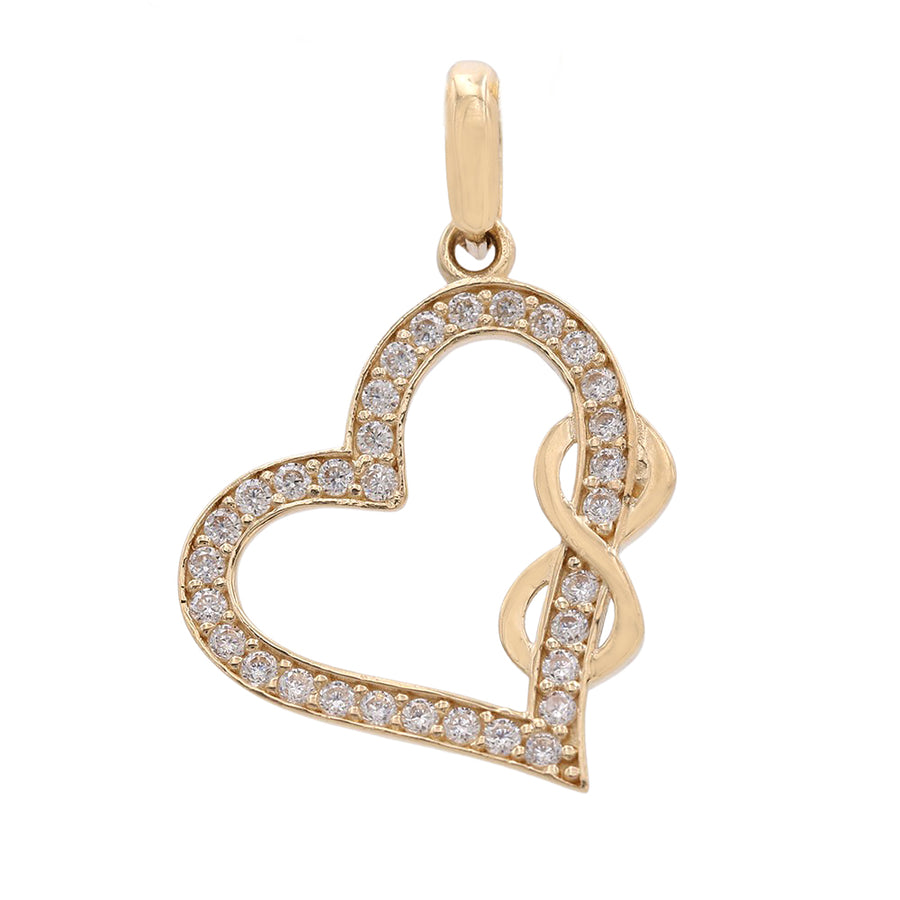 This Yellow Gold 14k Small Heart Pendant With Cz, from Miral Jewelry, is adorned with sparkling diamonds.