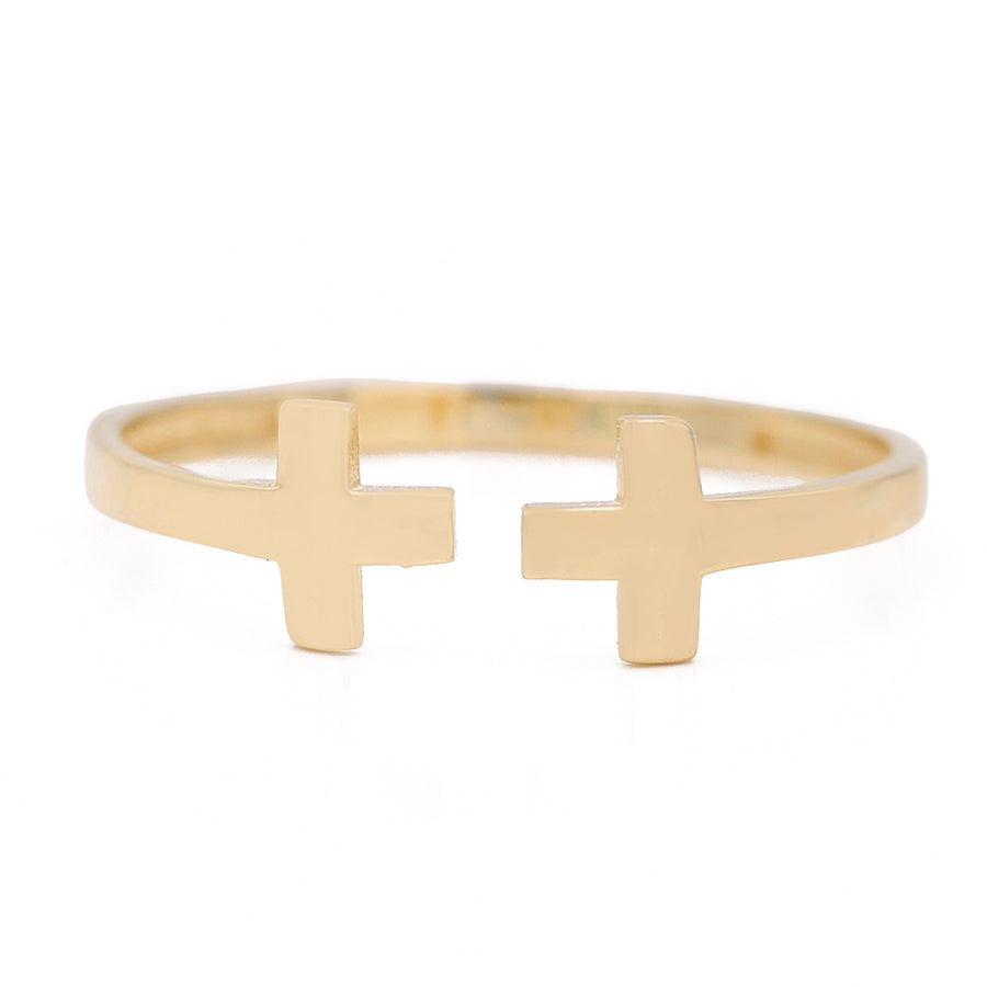 A trendy Miral Jewelry gold plated cross cuff ring featuring a double cross design, crafted with 14K yellow gold for a fashionable look.