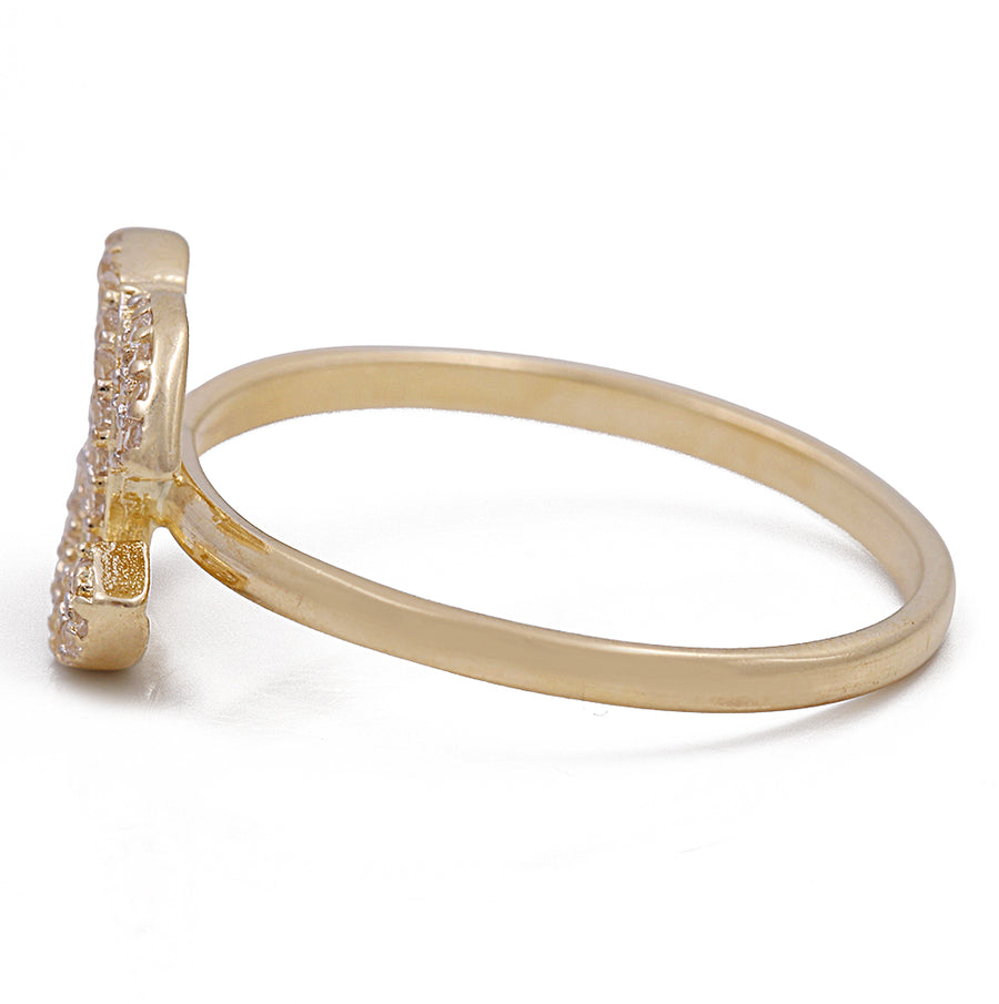 A Miral Jewelry 14K yellow gold fashion ring with Cubic Zirconias in the center.