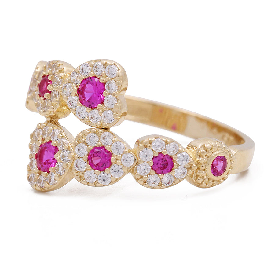 A Miral Jewelry 14K Yellow Gold Fashion Ring adorned with pink sapphires and diamonds.