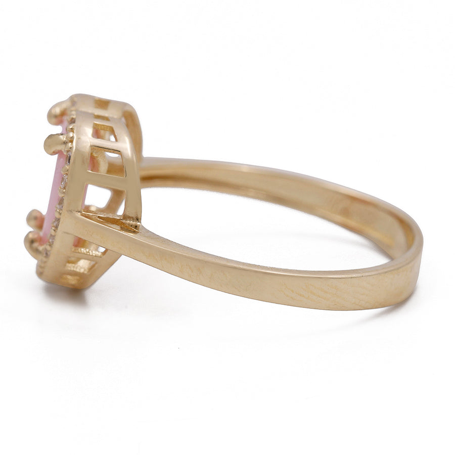 Miral Jewelry's 14K Yellow Gold Fashion Pink Stone Heart with Cubic Zirconias Ring.
