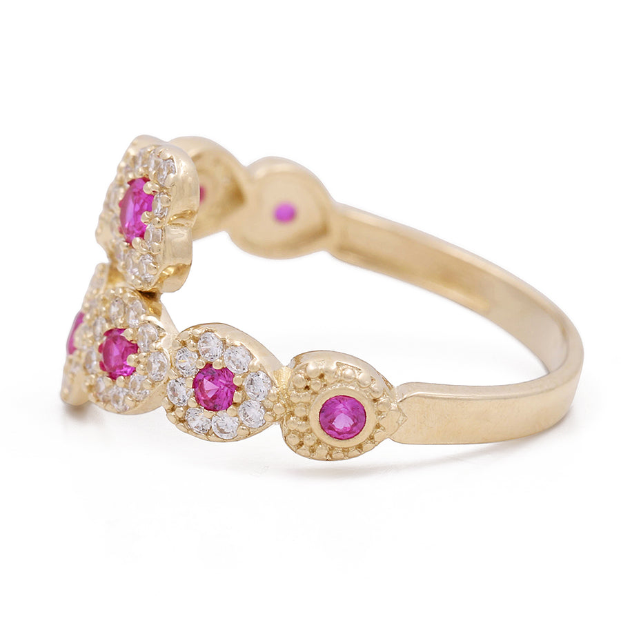 A Miral Jewelry 14K Yellow Gold Fashion Ring with Color Stones and Cubic Zirconias.