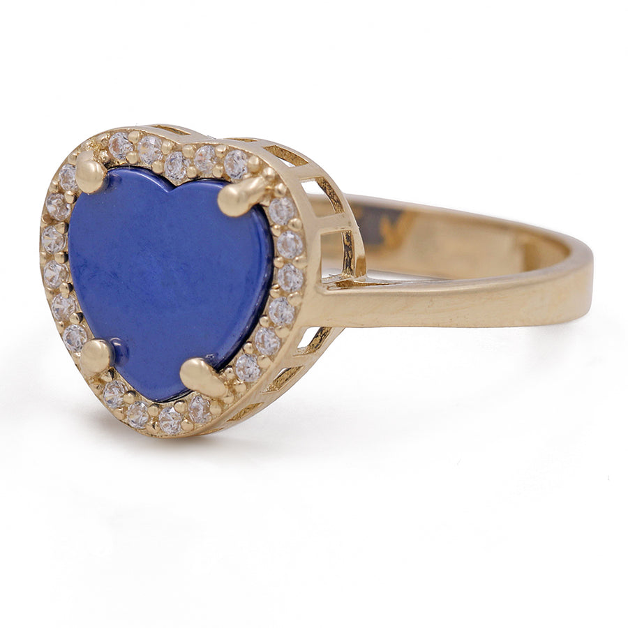 A Miral Jewelry 14K Yellow Gold Fashion Ring with Blue Heart Center Stone and Cubic Zirconias.