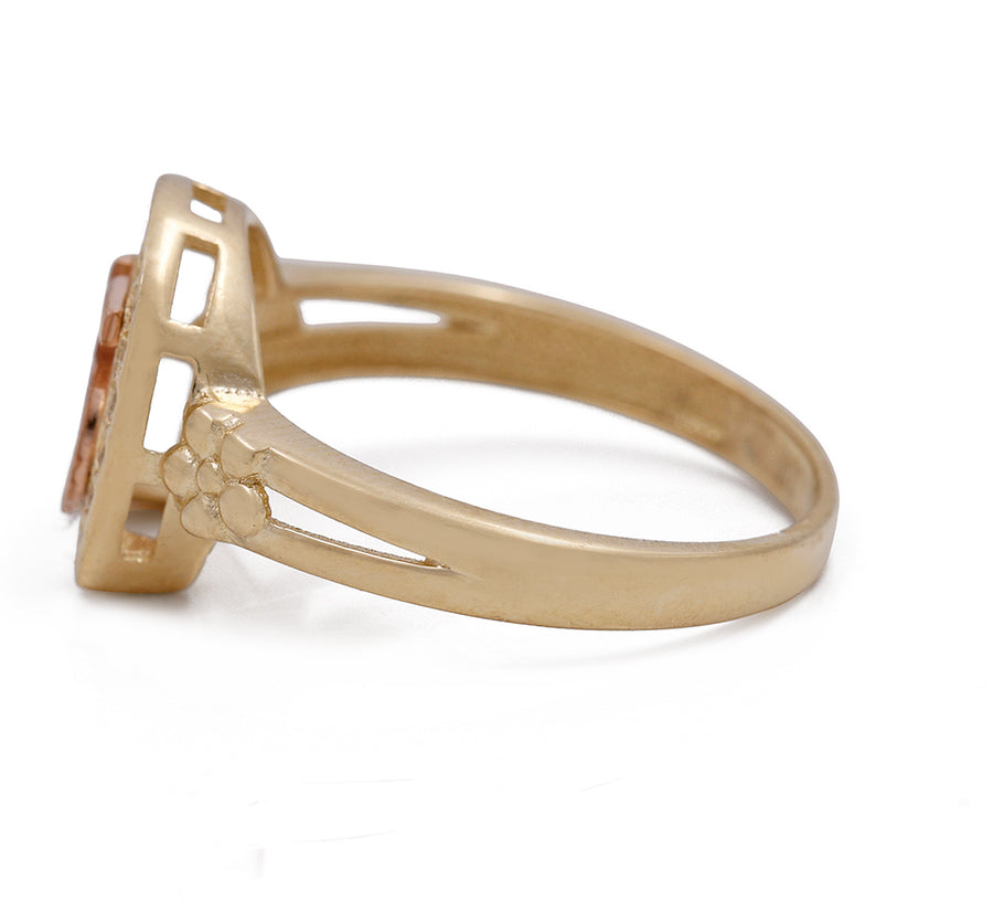 A 14K Yellow and Rose Gold 15 Horseshoe Ring with Cubic Zirconias by Miral Jewelry with a morganite stone and gold accents.