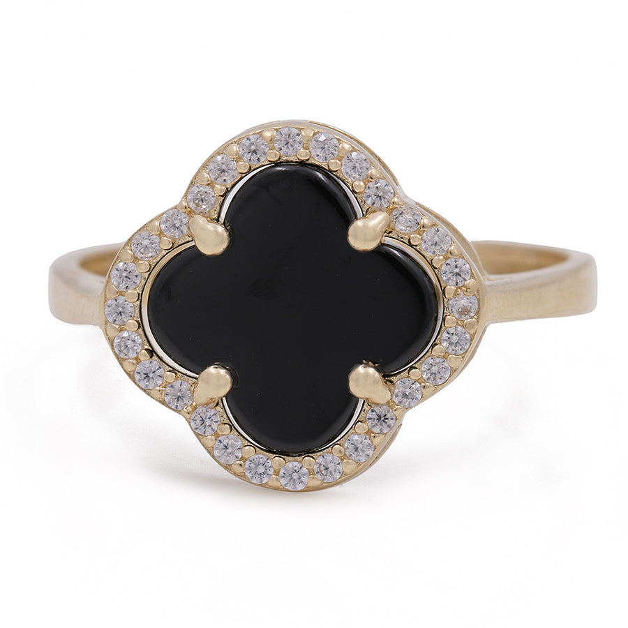 A Miral Jewelry 14K yellow gold fashion ring featuring a black onyx flower center stone and cubic zirconias as accents.