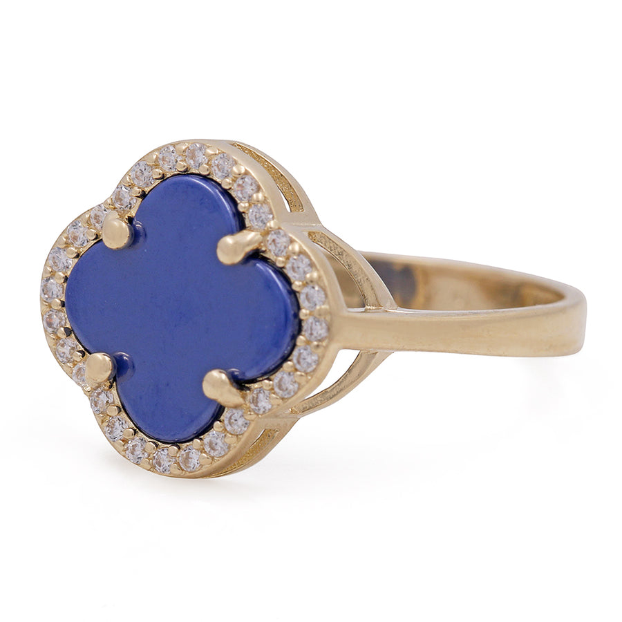 A Miral Jewelry fashion ring with a 14K Yellow Gold and Blue Color Stone and Cubic Zirconias.