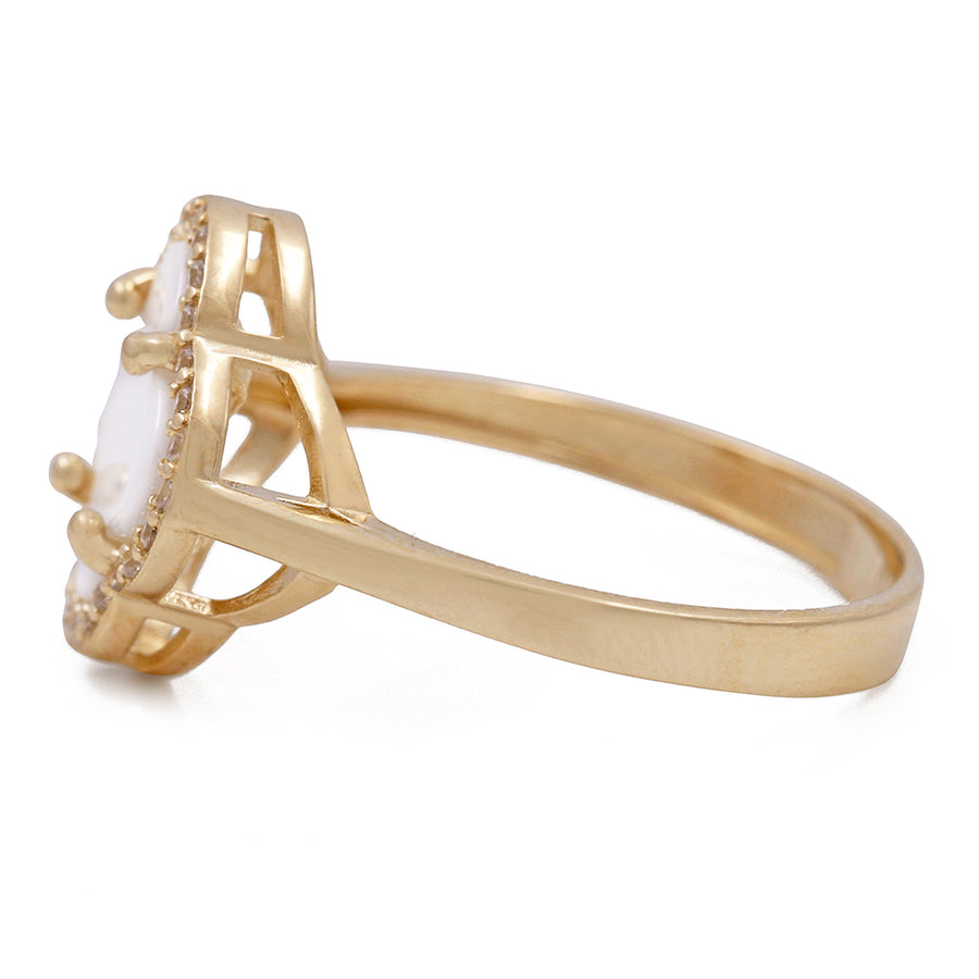 A Miral Jewelry 14K Yellow Gold Fashion Ring adorned with a white mother of pearl stone.