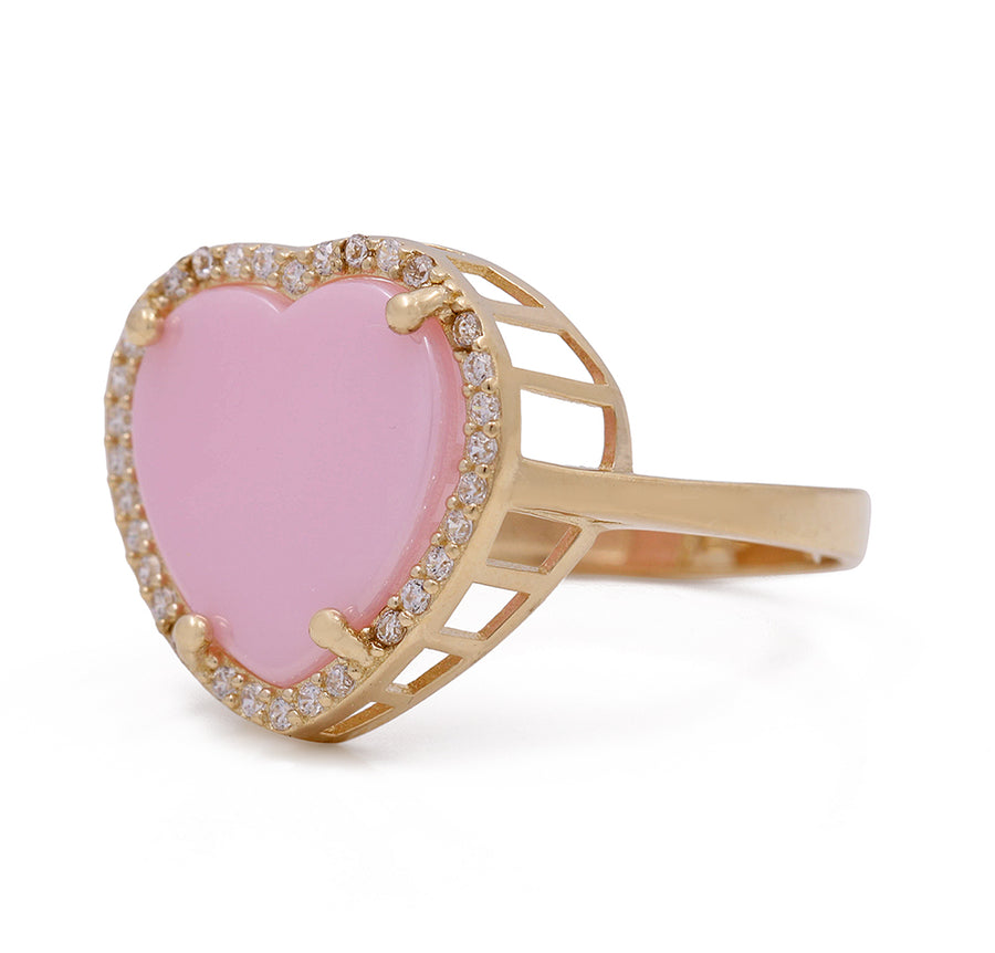 A fashionable Miral Jewelry ring featuring a 14K Yellow Gold Fashion Pink Stone Heart with Cubic Zirconias.