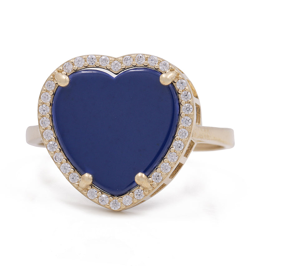 A 14K Yellow Gold Fashion Ring with Blue Heart Center Stone and Cubic Zirconias by Miral Jewelry.