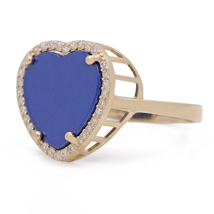 A Miral Jewelry 14K Yellow Gold Fashion Ring featuring a heart-shaped blue lapis stone at the center and adorned with cubic zirconias.