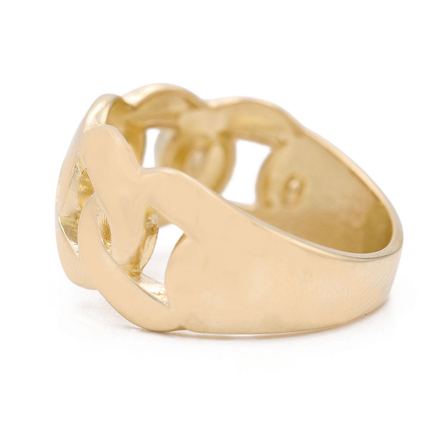 An elegant Miral Jewelry 14K Yellow Gold Fashion Link Ring with a heart shaped design.