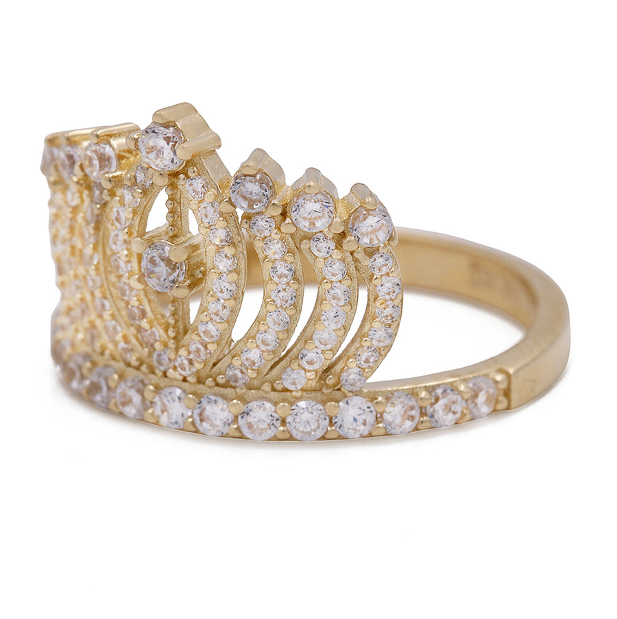 A Miral Jewelry 14K yellow gold tiara ring adorned with white diamonds.