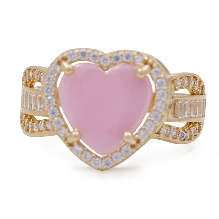 A Miral Jewelry heart shaped pink stone ring with diamonds, embellished in 14K yellow gold and adorned with Cubic Zirconia accents.