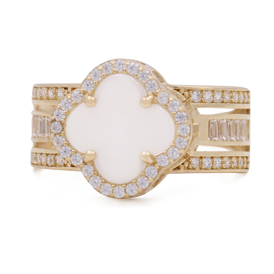 A fashionable 14K Yellow Gold Fashion Mother of Pearl Flower with Cubic Zirconias ring adorned with sparkling diamonds and crafted in stunning yellow gold by Miral Jewelry.