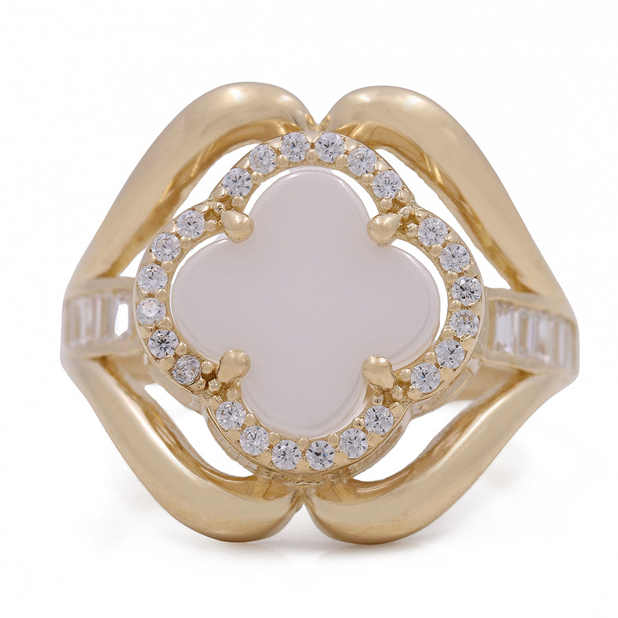 A Miral Jewelry 14K Yellow Gold Fashion Ring with Mother of Pearl Flower Center Stone and Cubic Zirconias.
