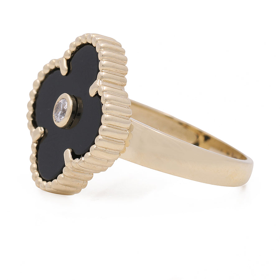 A Miral Jewelry 14K Yellow Gold with Black Onyx and Cubic Zirconias Flower Fashion Ring with diamonds.