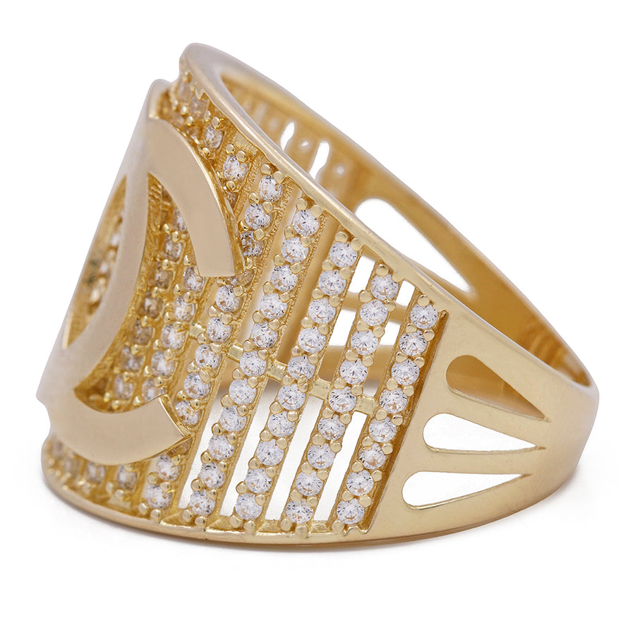 Miral Jewelry 14K Yellow Gold Fashion Ring with Cubic Zirconias, with diamonds and a Chanel cc ring in yellow gold.