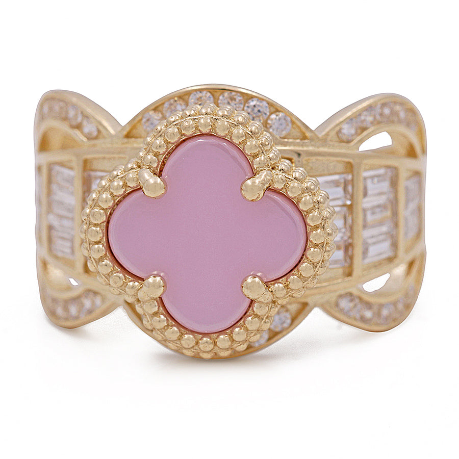 A Miral Jewelry 14K Yellow Gold Fashion Ring with Pink Color Stone and Cubic Zirconias.