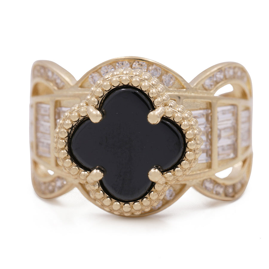 A Miral Jewelry fashion ring featuring a stunning black onyx stone set in 14K yellow gold, accompanied by glittering cubic zirconia accents.