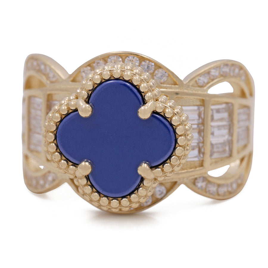 A fashionable Miral Jewelry 14K Yellow Gold Fashion Ring with Blue Color Stone and Cubic Zirconias and diamonds.