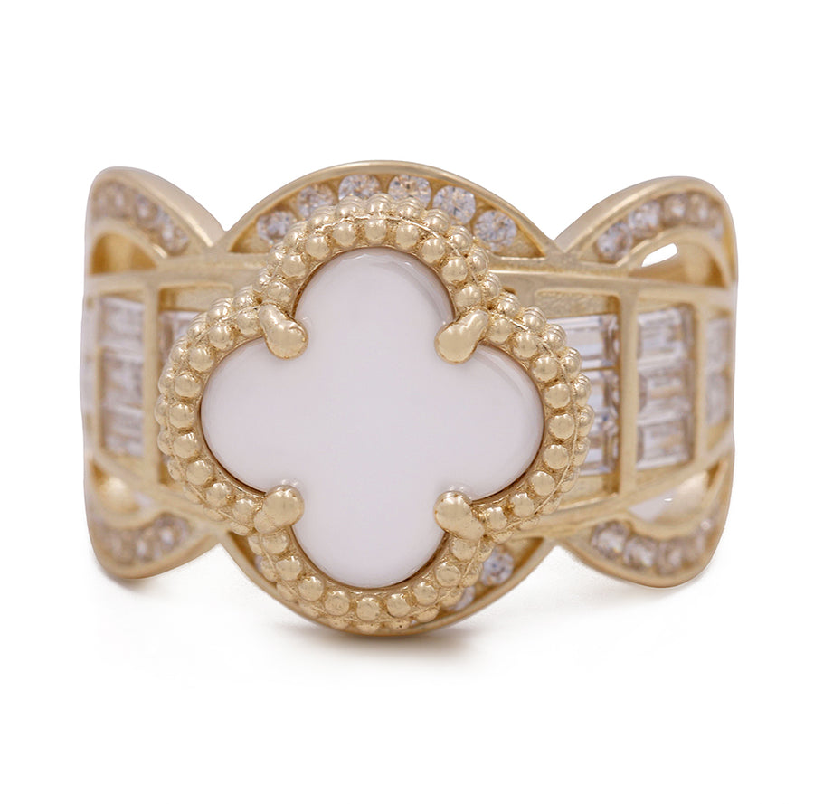 A Miral Jewelry 14K yellow gold fashion ring with mother of pearl and cubic zirconias.
