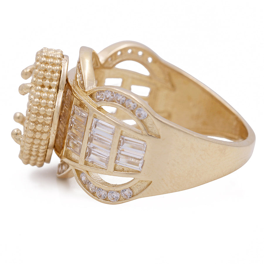 A Miral Jewelry 14K Yellow Gold Fashion Ring with Mother of Pearl and Cubic Zirconias with diamonds and baguettes.