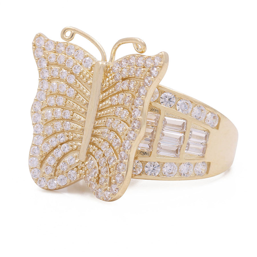 A Miral Jewelry 14K Yellow Gold Fashion Butterfly Ring adorned with white diamonds.