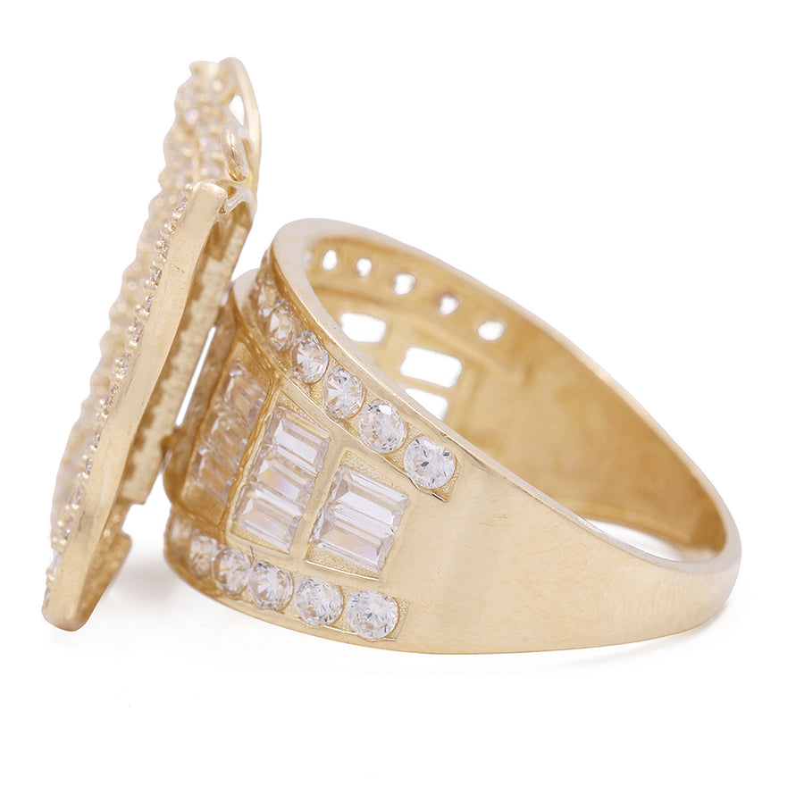 A Miral Jewelry 14K yellow gold ring with diamonds and baguettes.